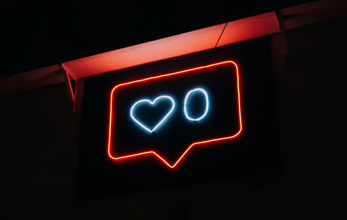 Neon sign showing an instagram notification with no likes in a blog post about Instagram removing likes in Australia by Sketch Corp.